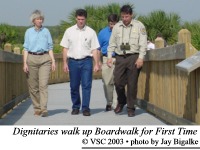 Dignitaries as they walk up the Centennial Boardwalk for the First Time